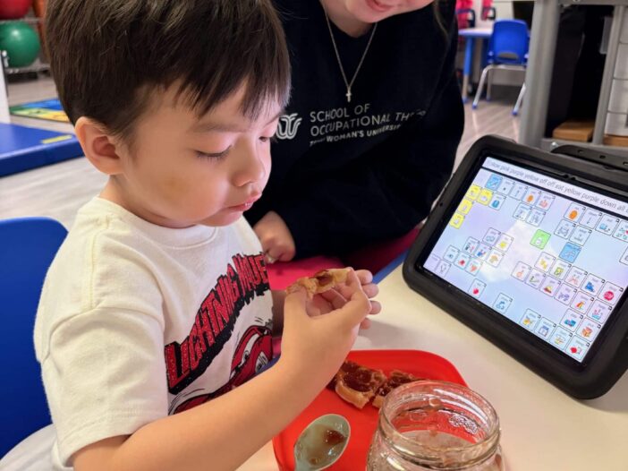 What makes The Warren Center different shown through pediatric therapy session in Dallas with therapist and child